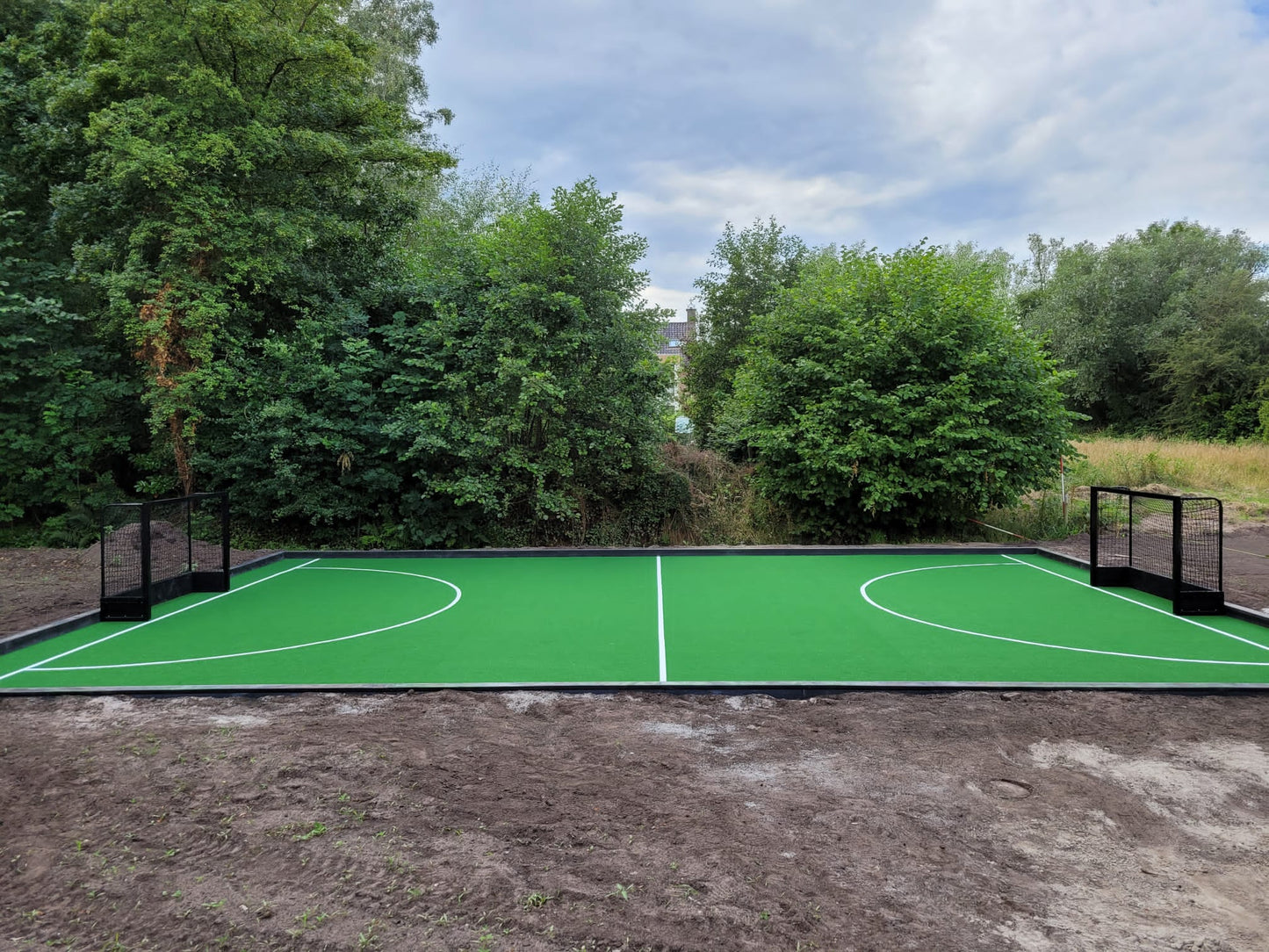 Kunstgras in de tuin - Nobel Grass waterveld professioneel - Privé Hockeyveld - Haren