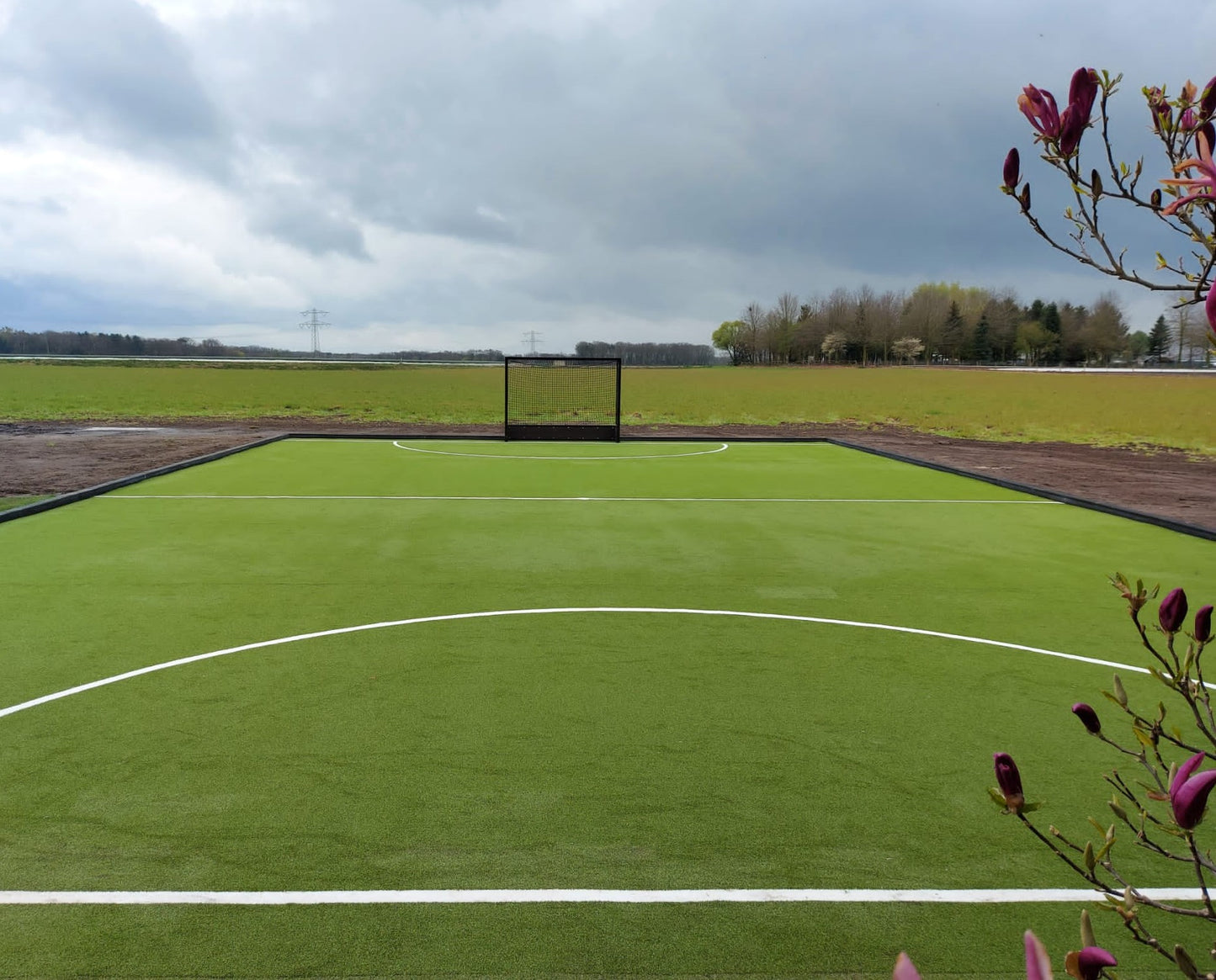 Kunstgras in de tuin - Nobel Grass waterveld professioneel - Privé Hockeyveld - Maasbree